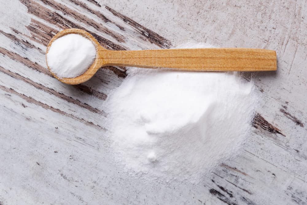 A Photo of Baking Soda and a Wooden Spoon