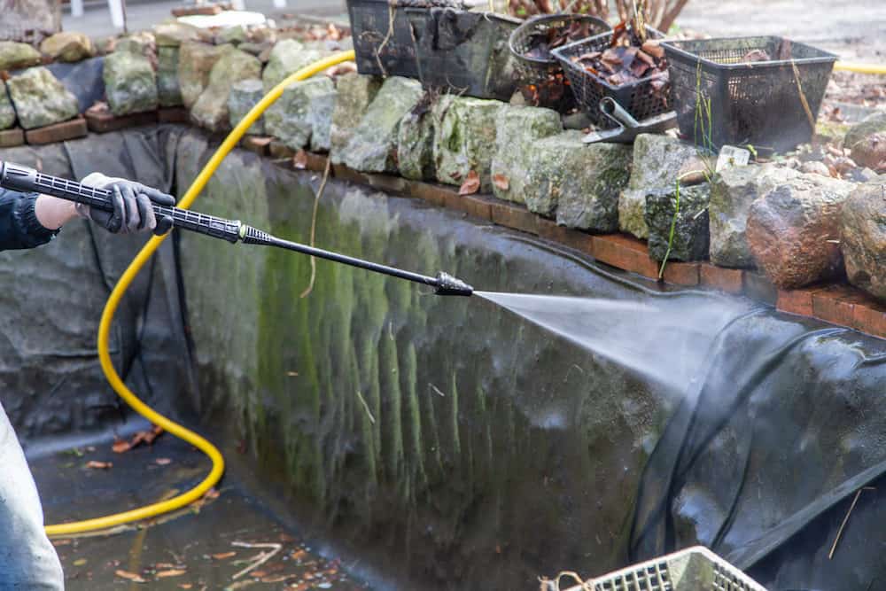 Cleaning a Koi Pond with a High Pressure Cleaner